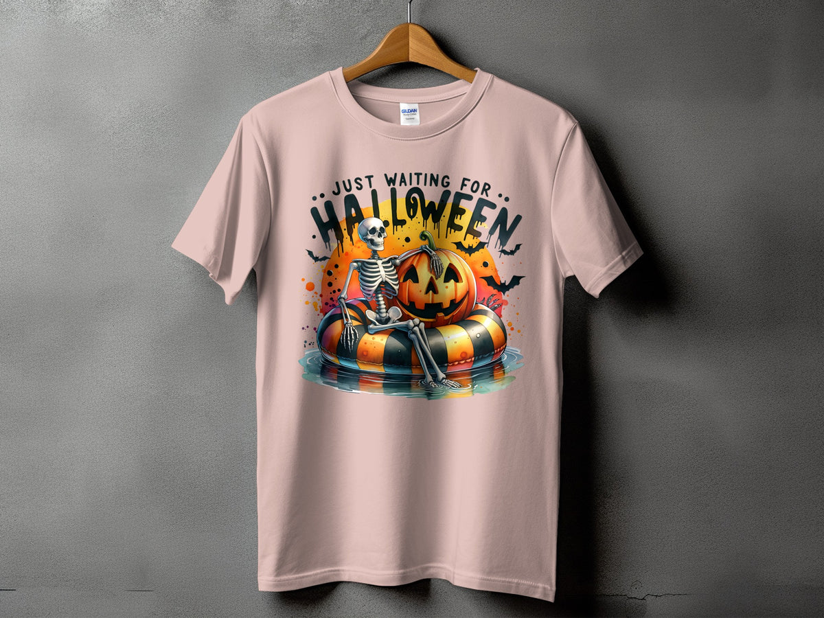 Skeleton on inflatable tube with pumpkin, "Just Waiting for Halloween" text.