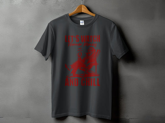 Dark grey t-shirt with red text and graphic: "Let's Watch Horror Movies and Chill".